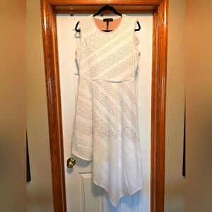 White sleeveless dress with fitted tan underlay. Diagonal length, see picture